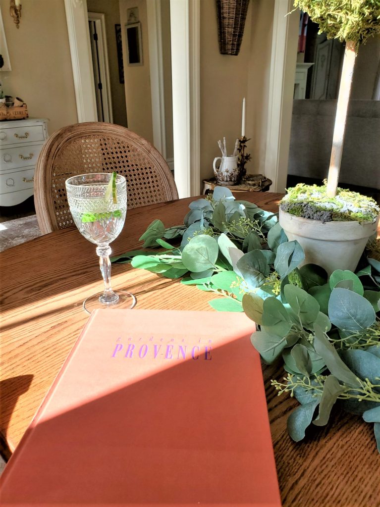 Everything You Need for an Amazing Indoor Garden Party with garden book and glass of water