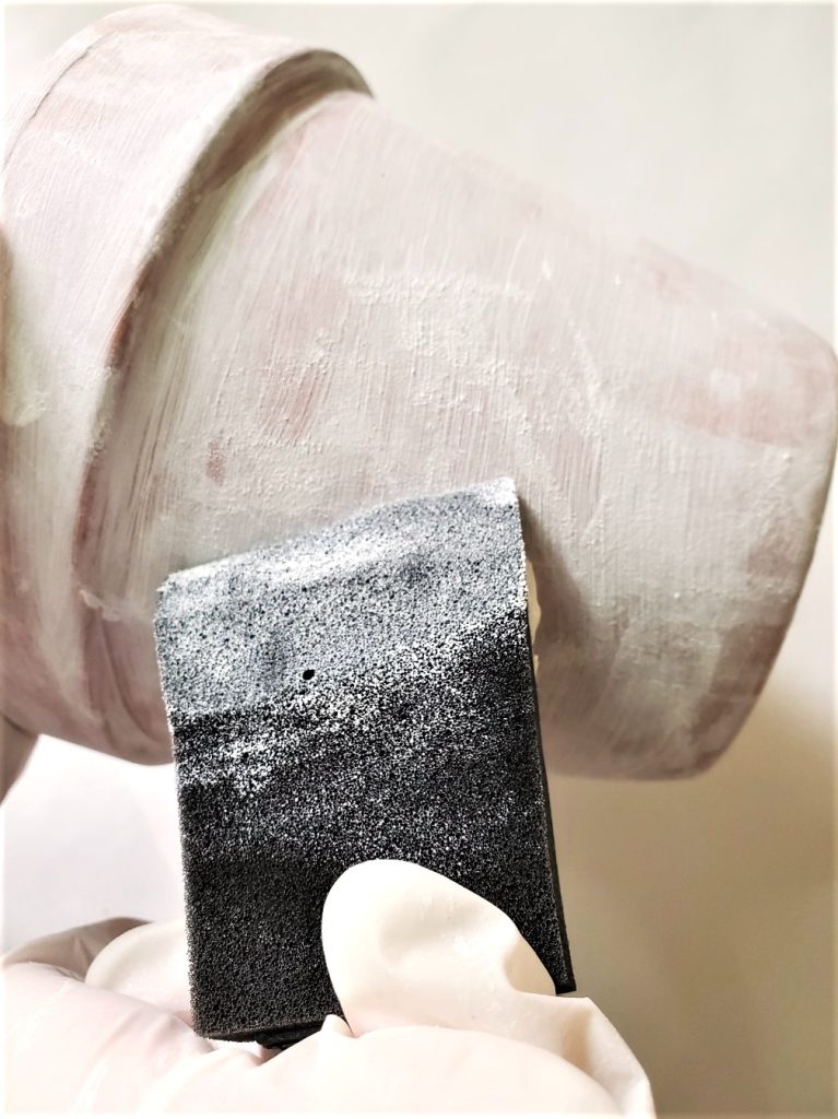 adding-texture-to-the-second-coat-of-white-paint-with-a-brush