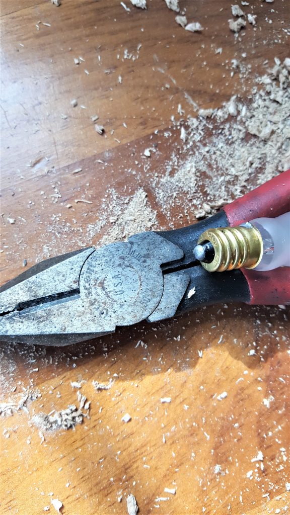 light bulb and pliers How To Make Flameless Candle DIY