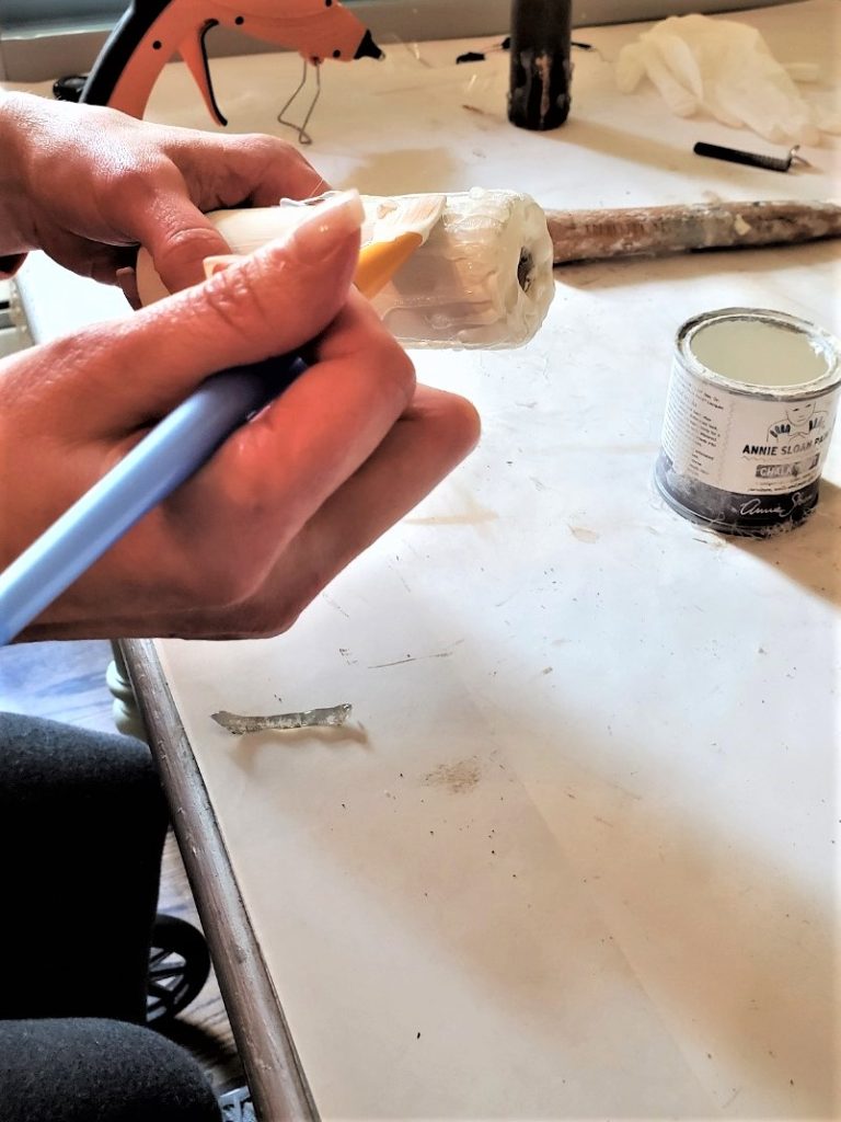 painting the drips on the candle DIY to blend