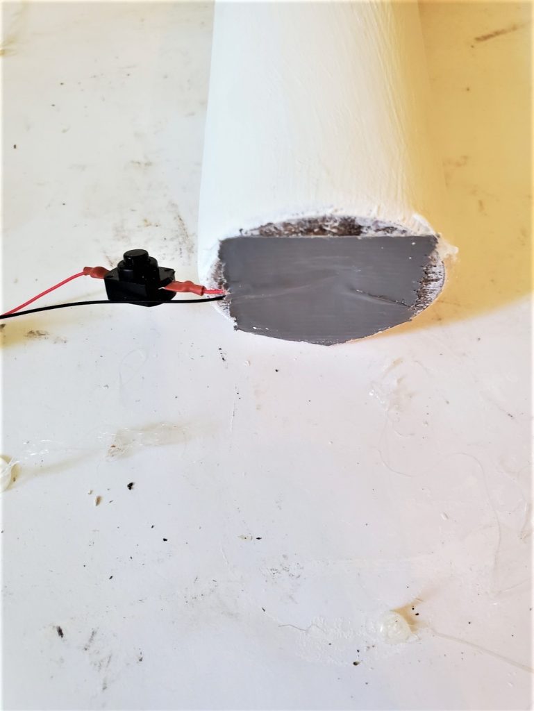 duct tape to hold the wire in the candle base