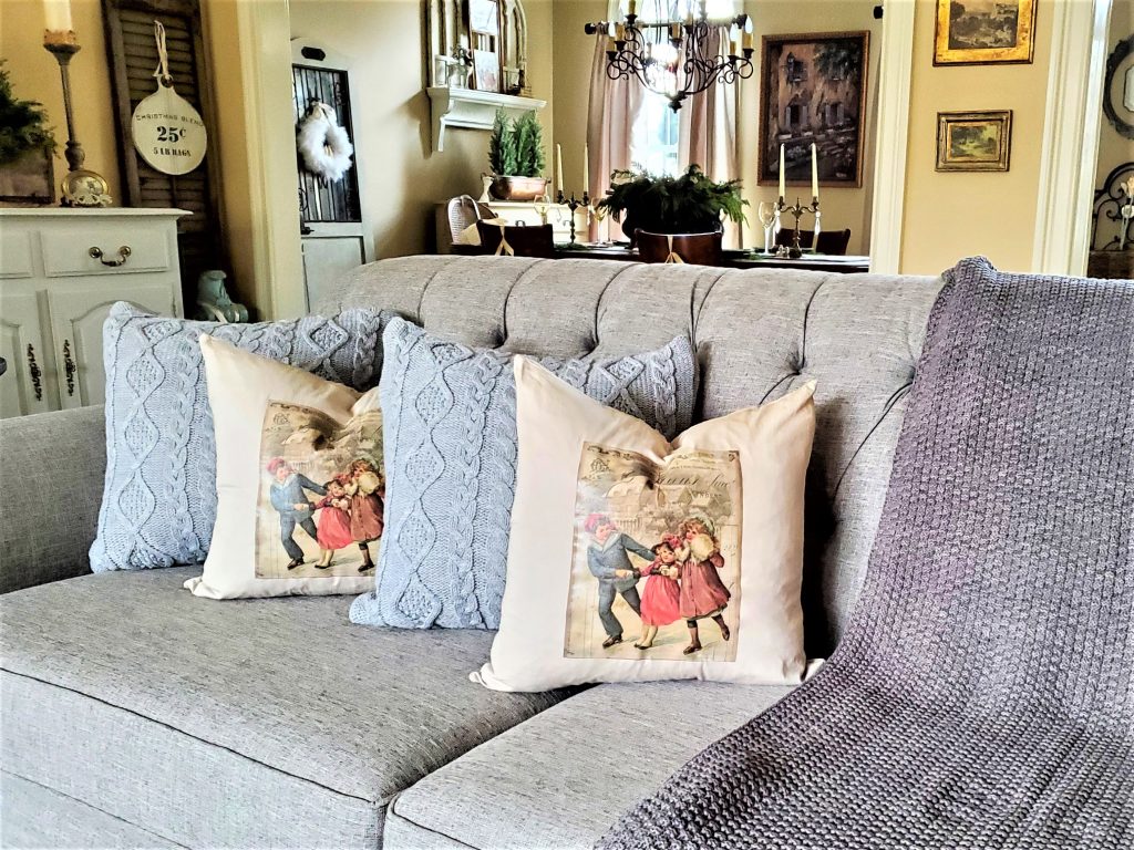showing the finished winter pillows on our couch 