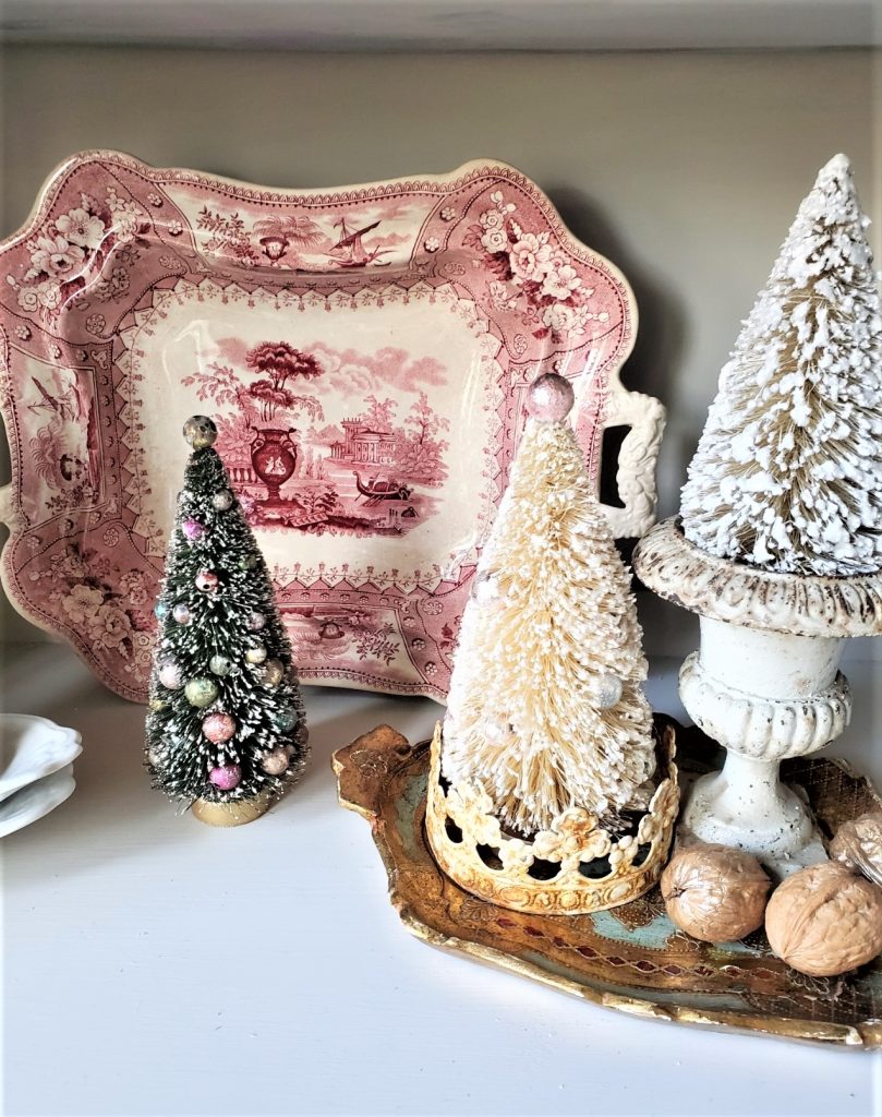 more bottle brush trees, walnuts and a small urn