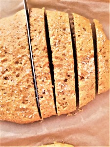 best-soft-biscotti-cutting-the-cookies-into-slices-with-a-sharp-knife
