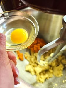 adding-egg-to-mixer