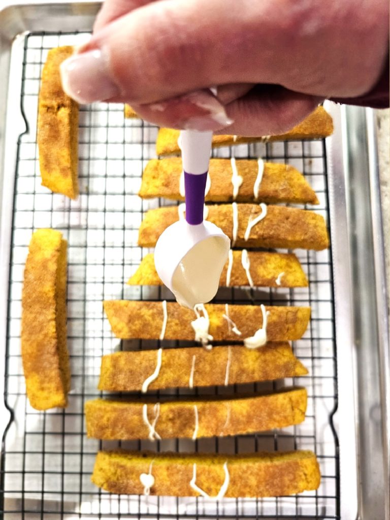 biscotti-drizzling-with-white-chocolate