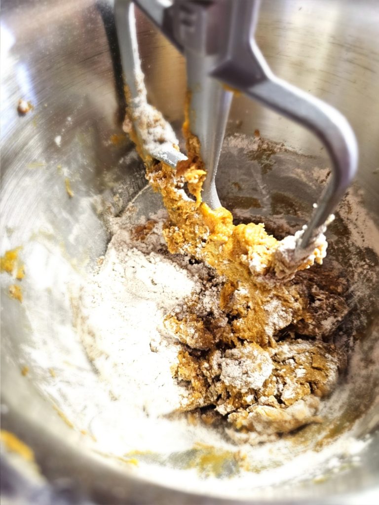 pumpkin-spice-biscotti-unlock-the-secret-recipe-biscotti-slowly-mixing-flour-into-the-ingredients