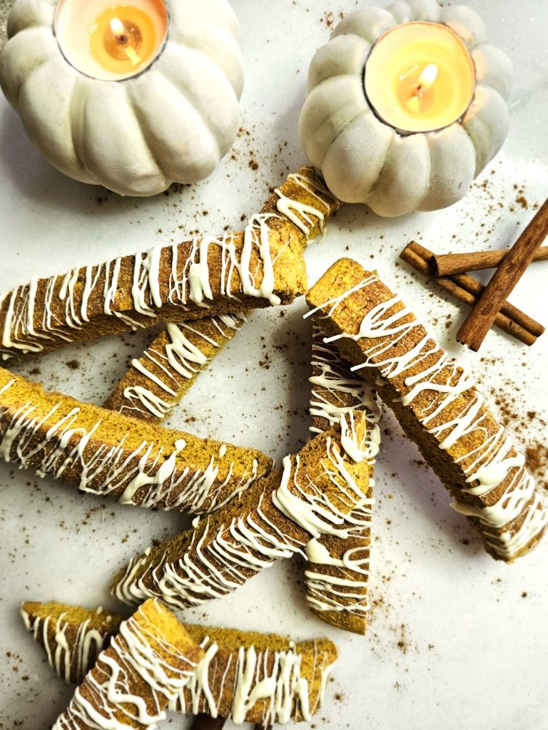 biscotti-stacked-with-pumpkin-candle-and-cinnamon