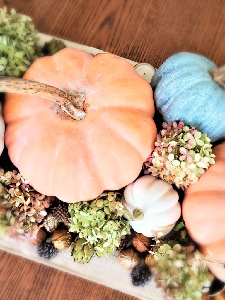 fall-centerpiece-ideas-on-a-budget-hydrangeas-pumpkins-on-table