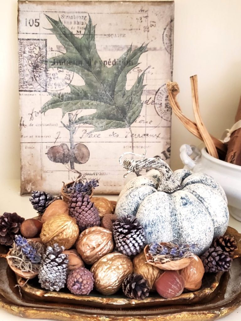 fall-centerpiece-ideas-on-a-budget-pumpkin-nuts-acorn-picture-leaning