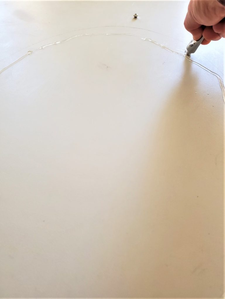 Adding the clear grip to the mirror base