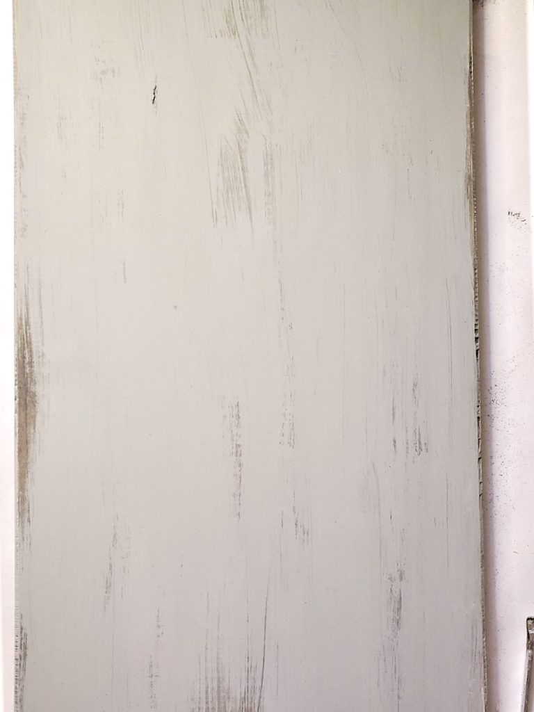 after-sanding-the-wood-on-the-sign