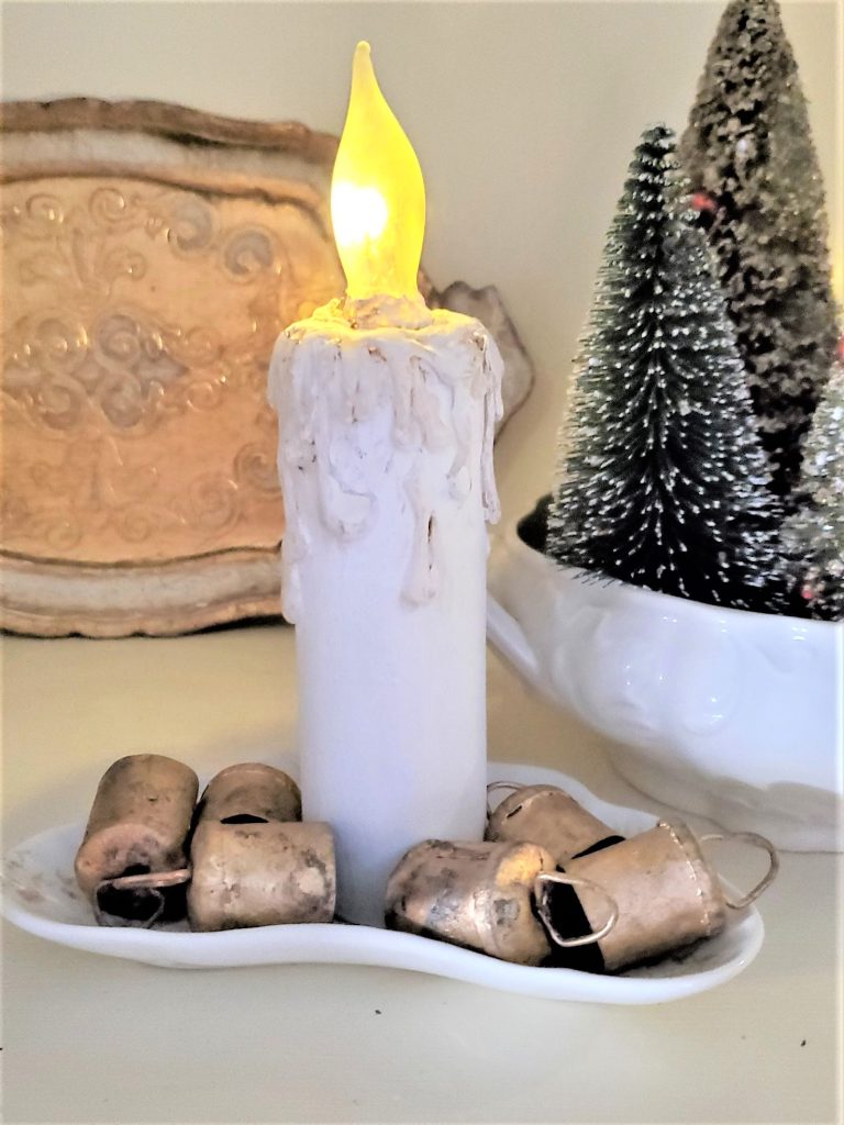 candle with bells