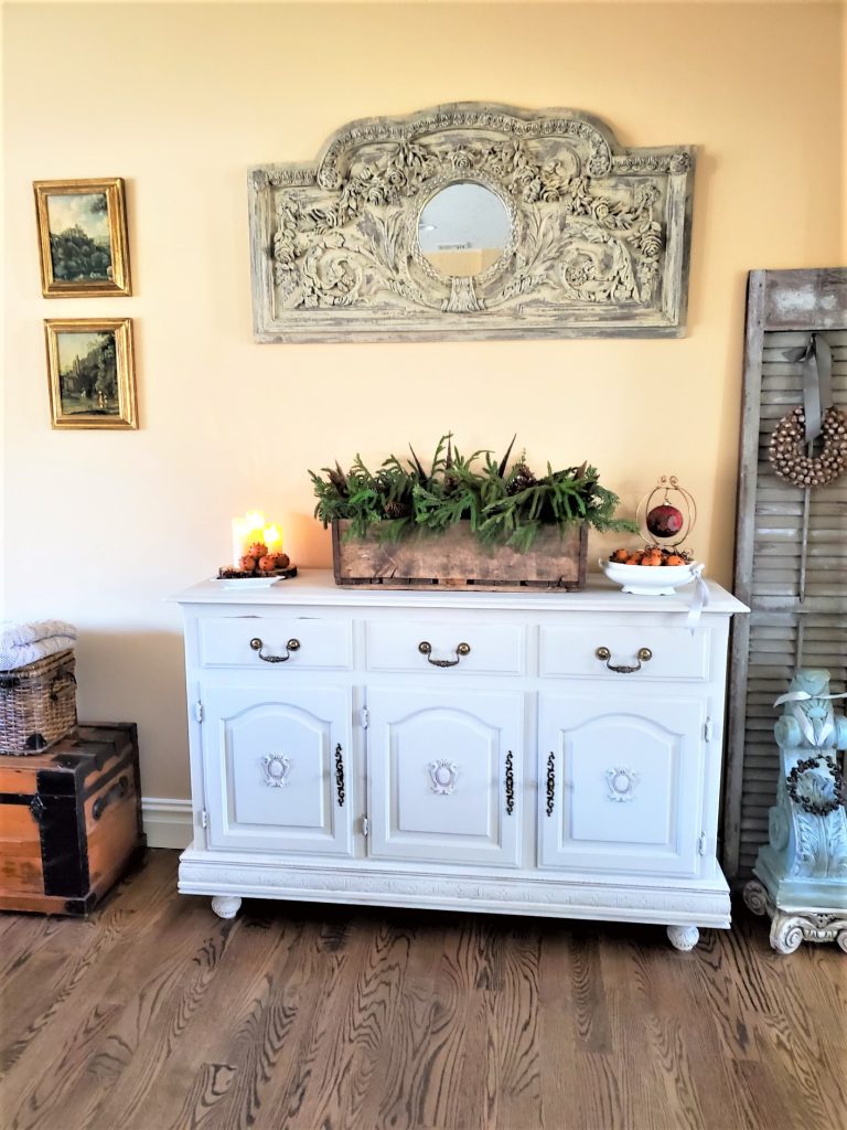 Full Picture of Old Fashioned Christmas Decorating Ideas Buffet with Greens, an ornament, dried oranges with cloves