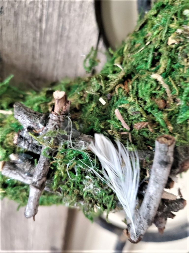 close-up-of-small-nest-on-wreath