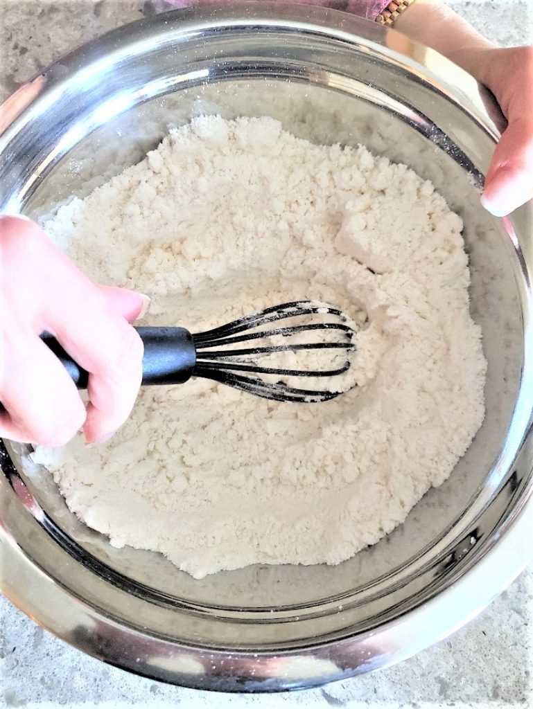 whisking-pudding-sugar-cookie-mix-and-flour-together