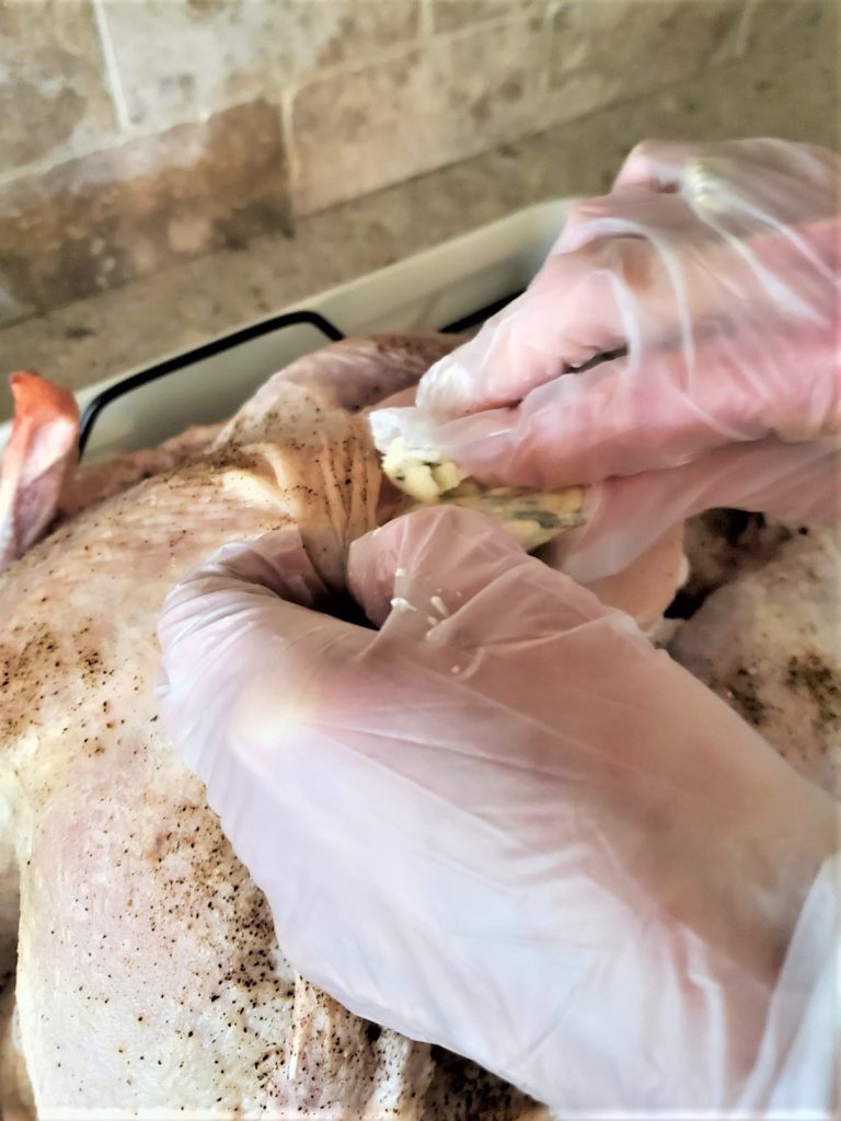 adding-sage-butter-under-breast-skin