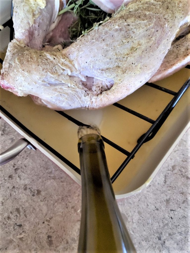 adding-wine-little-bit-for-juicy-turkey