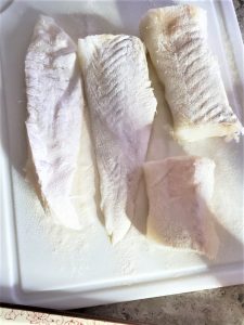 cod-fillets-covered-with-flour-for-best-baked-recipe