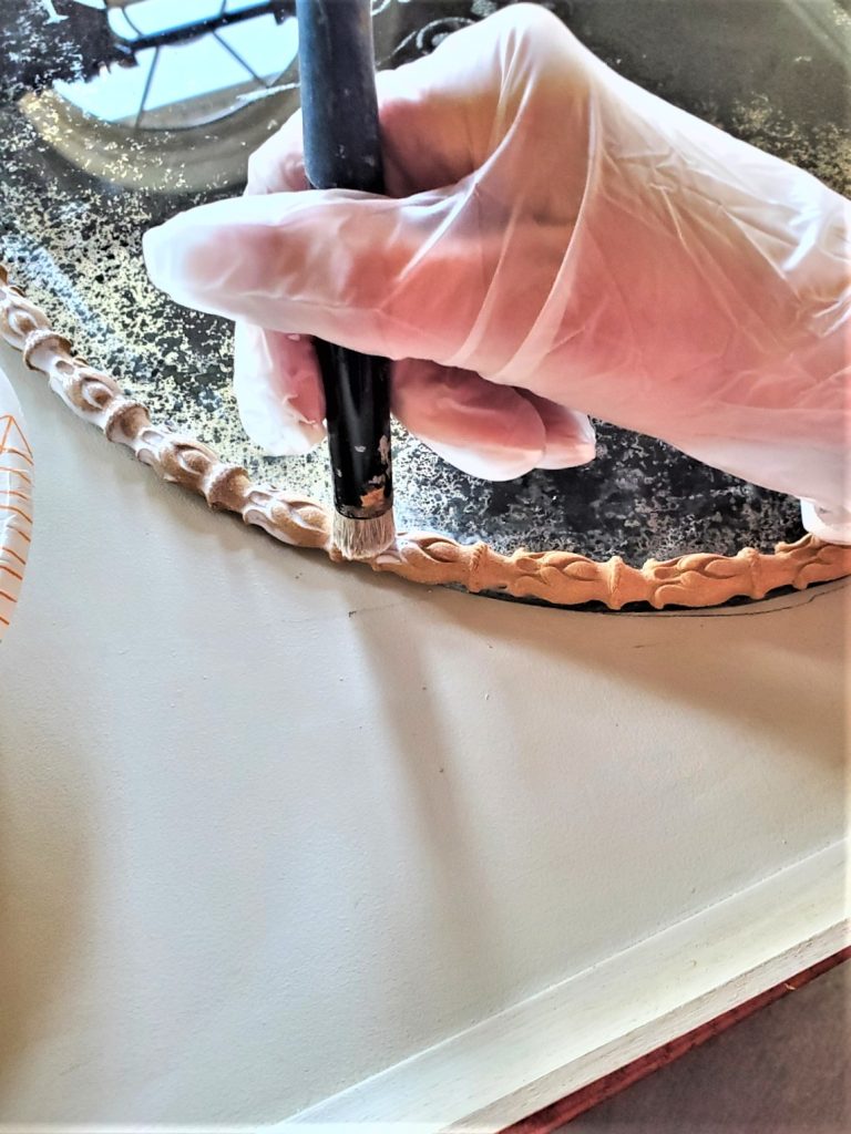 brushing-on-leafing-adhesive-diy-antique-mirror-tutorial