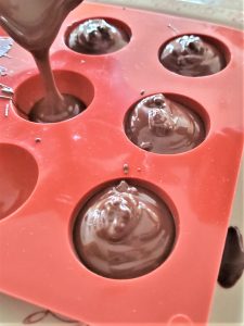 pouring-melted-chocolate-oreo-cookie-dirt-recipe