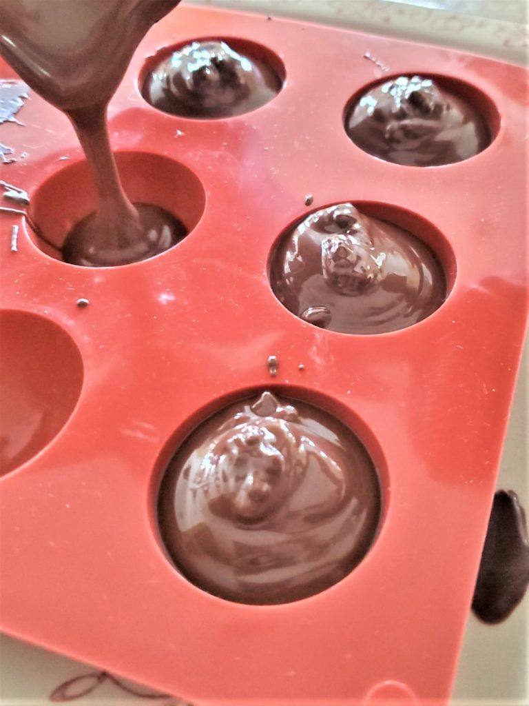 pouring-melted-chocolate-oreo-cookie-dirt-recipe