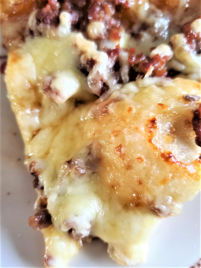 bite-taken-from-easy-fig-jam-sausage-pizza