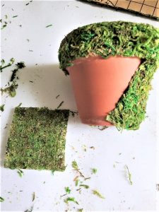 adding-self-stick-moss-to-flowerpot-