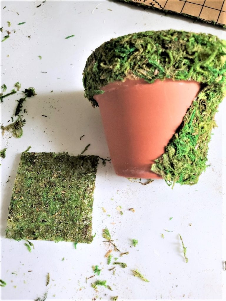 adding-self-stick-moss-to-flowerpot-