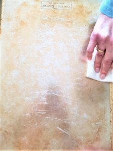 adding-crisco-with-paper-towel-baking-sheet
