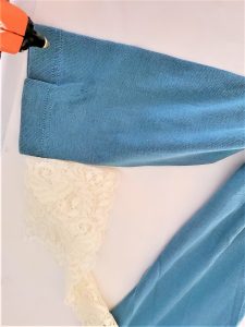adding-hot-glue-to-shirt-sleeve-diy-scarecrow-for-fall