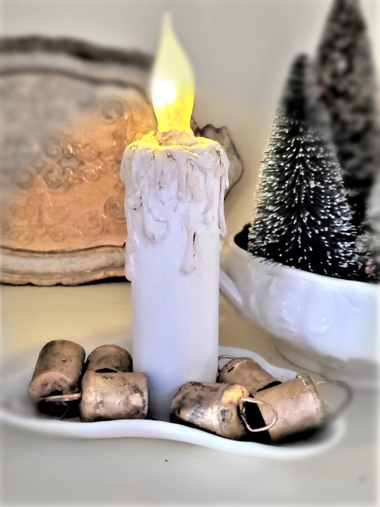 candle-and-brass-bells-one-of-the-symbols-of-christmas