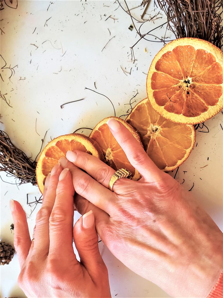 holding-orange-to-set