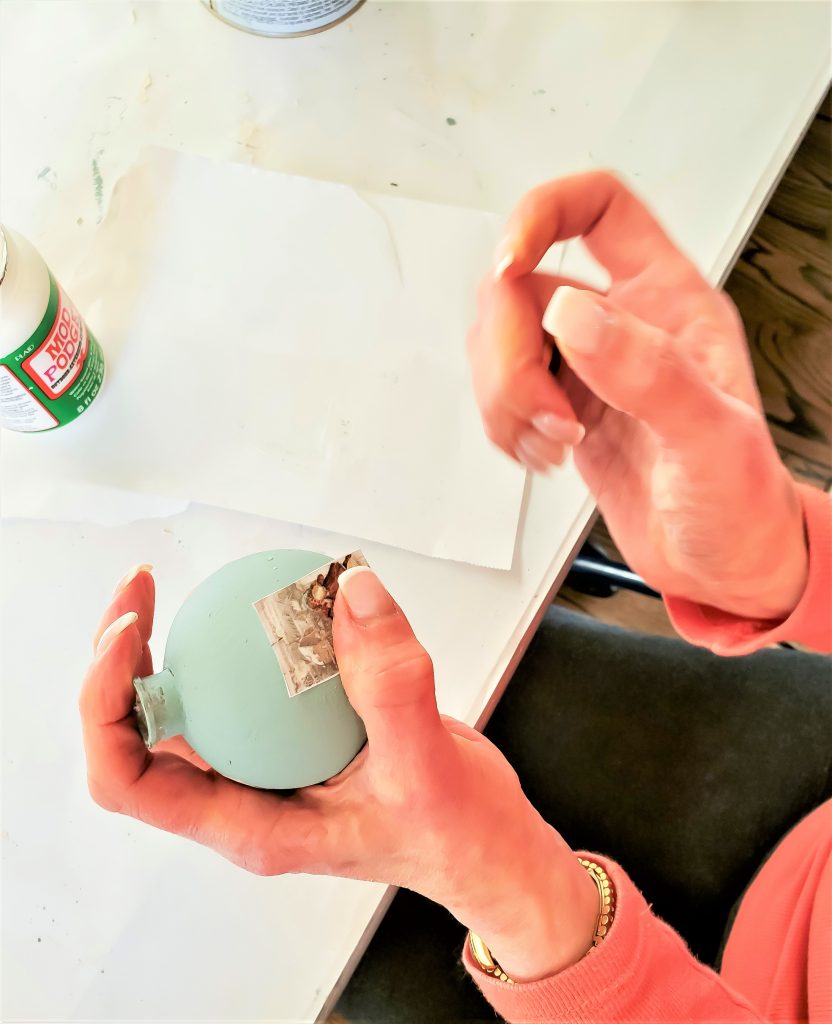 holding-image-to-set-easy-decoupage-Christmas-ornaments-DIY