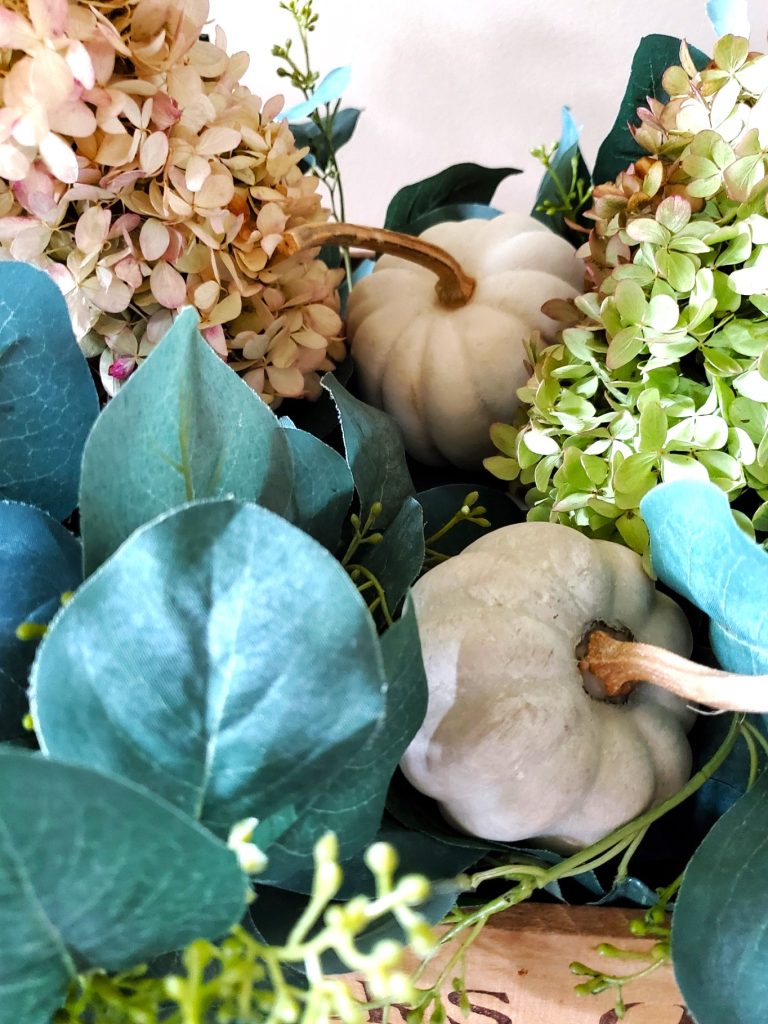 close-up-of-pumpkins-dried-hydrangeas