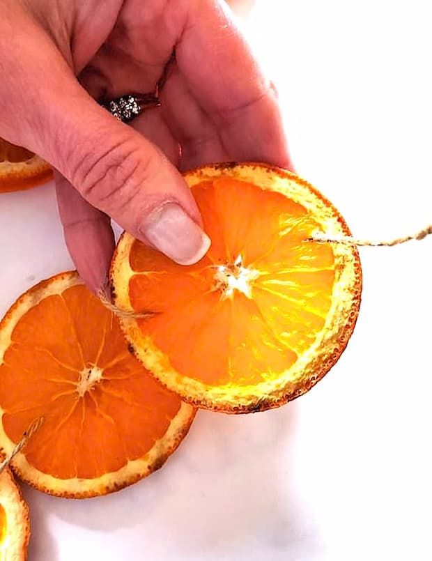 me-showing-some-oranges-twine-connected