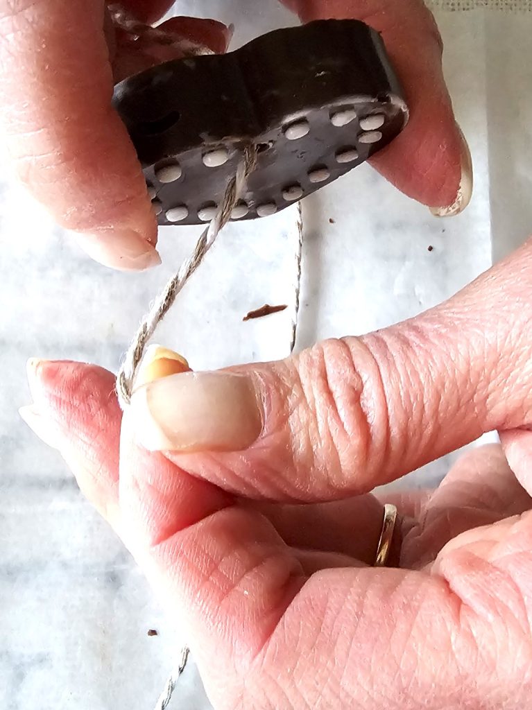 pushing-string-through-hole