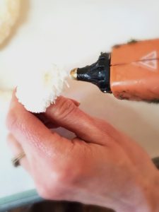 adding-glue-so-yarn-wont-fray