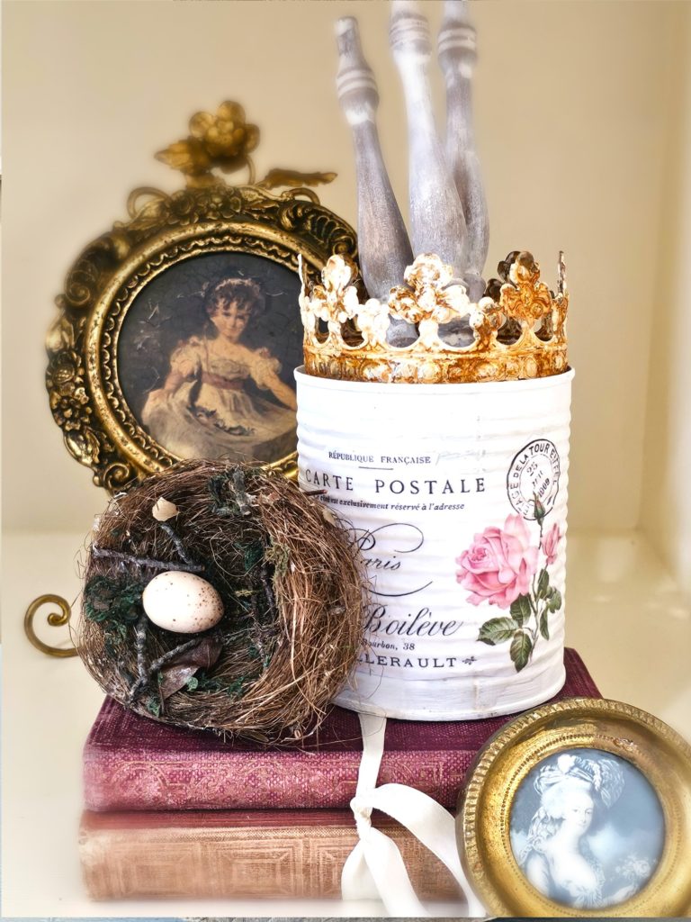 white-can-spindles-pink-books-crown