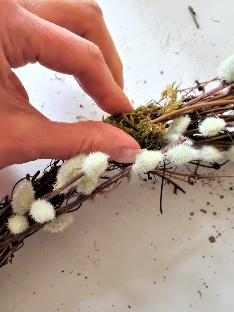 easy-natural-spring-wreath-holding-moss-to-set