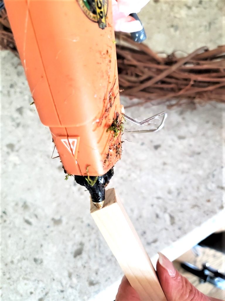 adding-glue-to-wood-dowel
