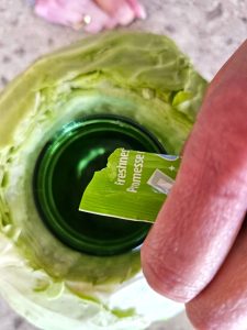 make-a-cabbage-vase-for-a-floral-arrangment-adding-flower-food