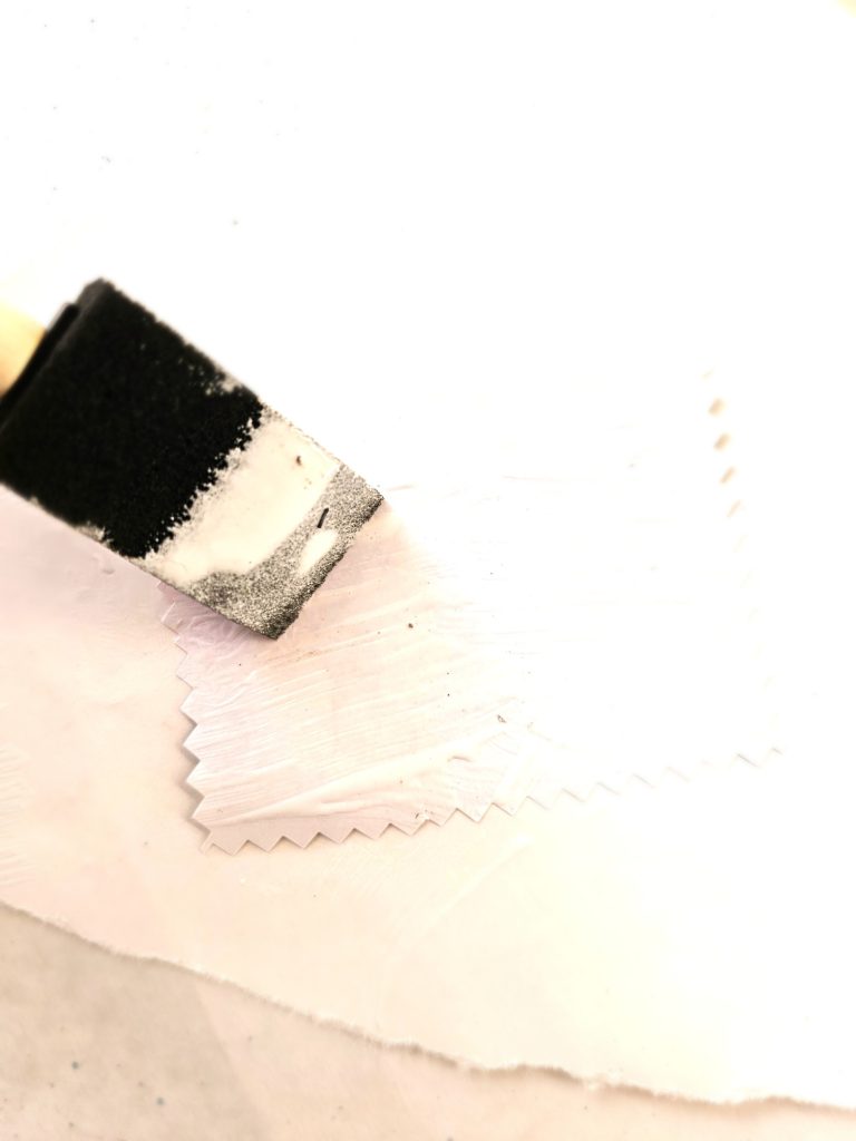 adding-mod-podge-to-the-back-of-image