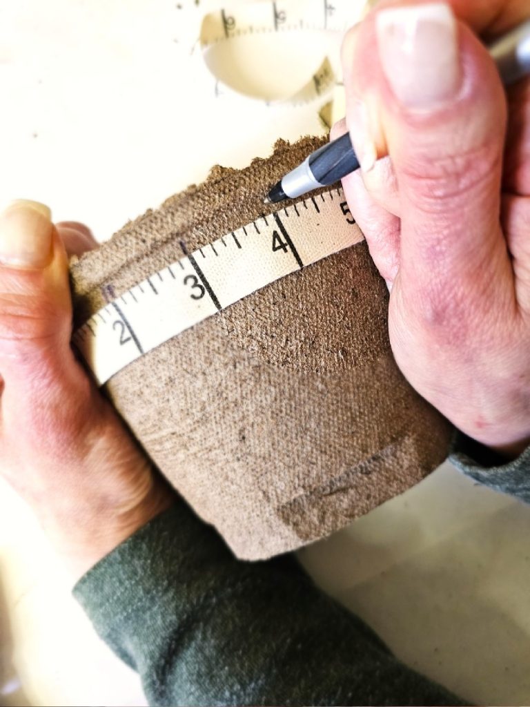 taper-measure-and-pen-making-dots-for-holes
