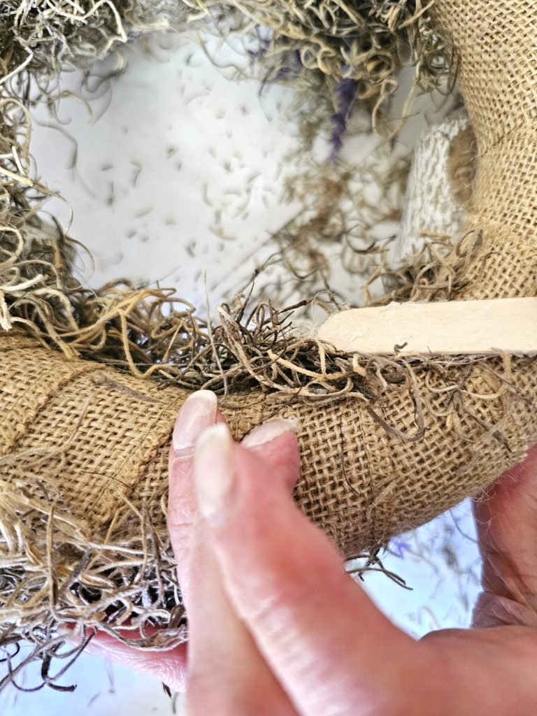 holding-spanish-moss-to-set