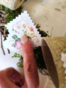 holding-second-stamp-on-the-first-to-set-with-finger