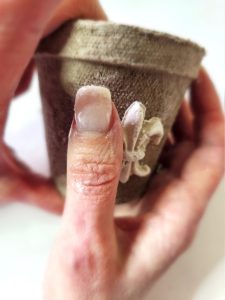 adding-clay-fluer-di-lis-to-pot