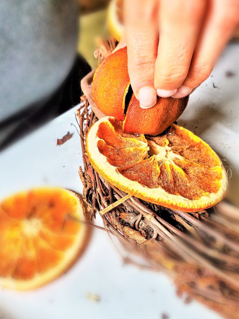 holding-orange-to-set