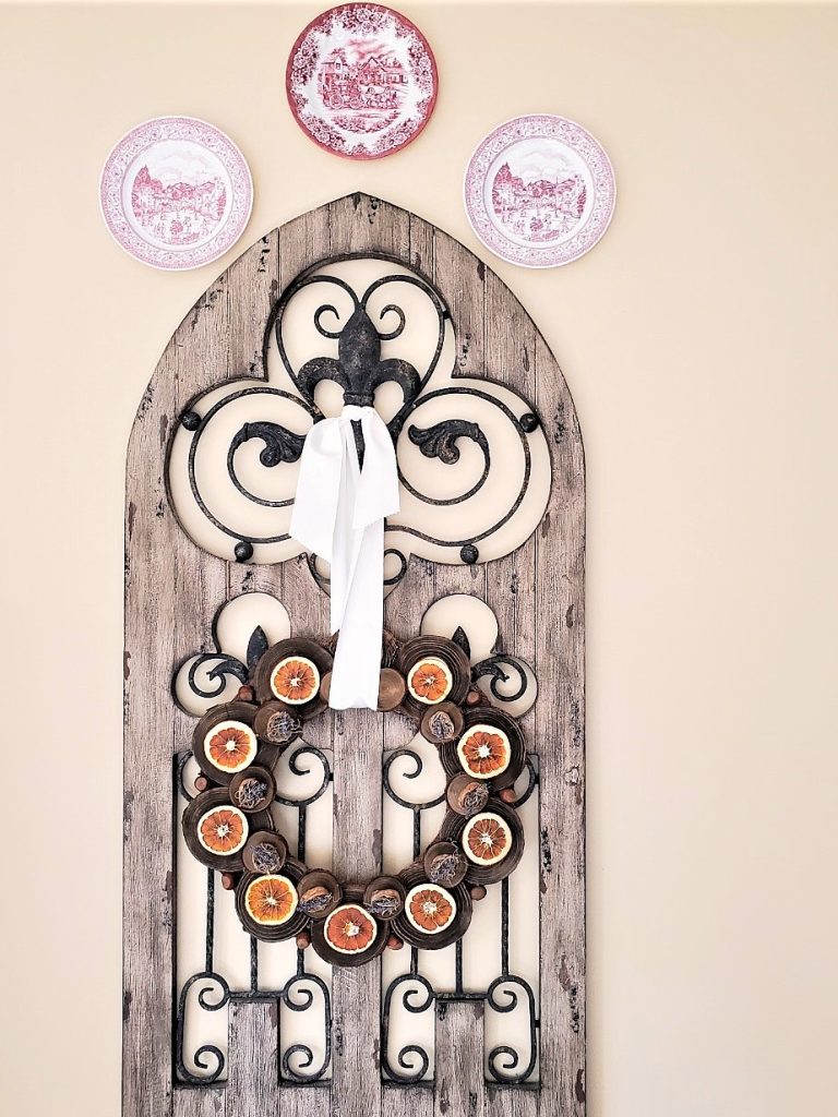 how-to-decorate-a-wire-wreath-frame-hanging-on-gate