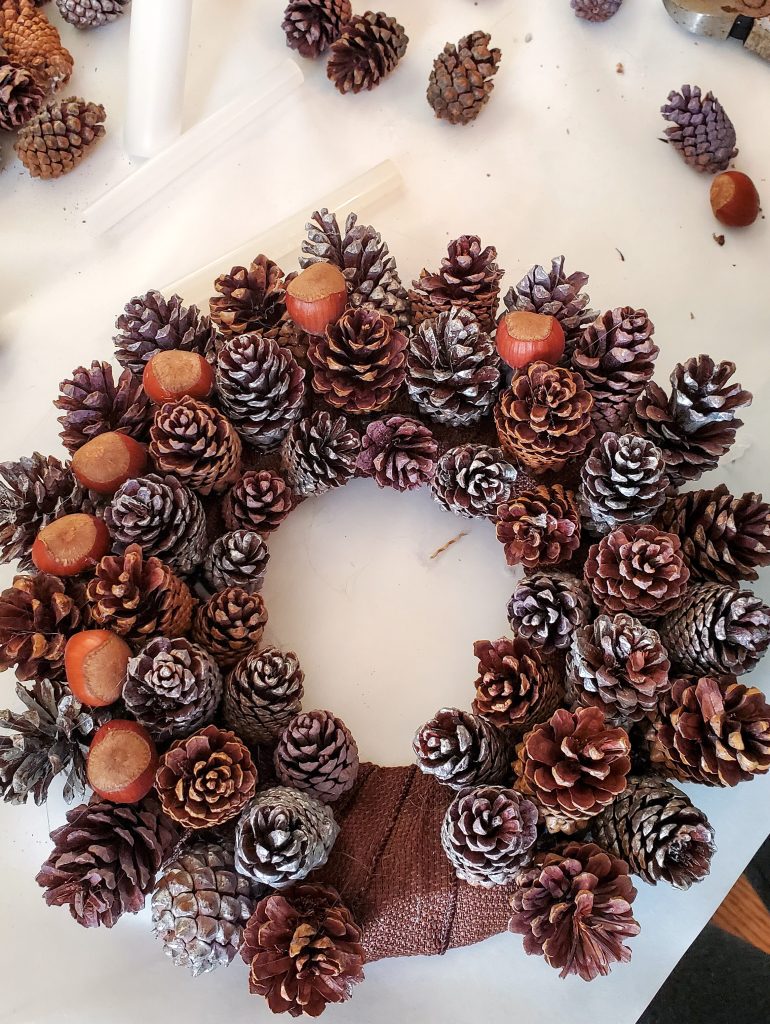 entire-wreath-filled-with-pinecones-and-a-few-hazlenuts